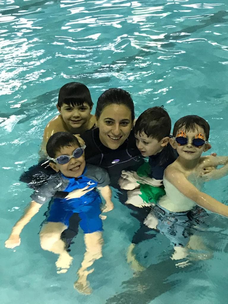 Toronto swim instructor with students